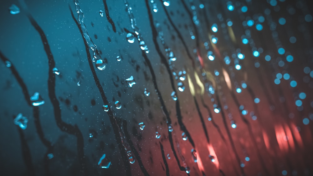 slow-mo photo of rain drops