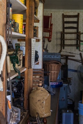 a room filled with lots of clutter and furniture