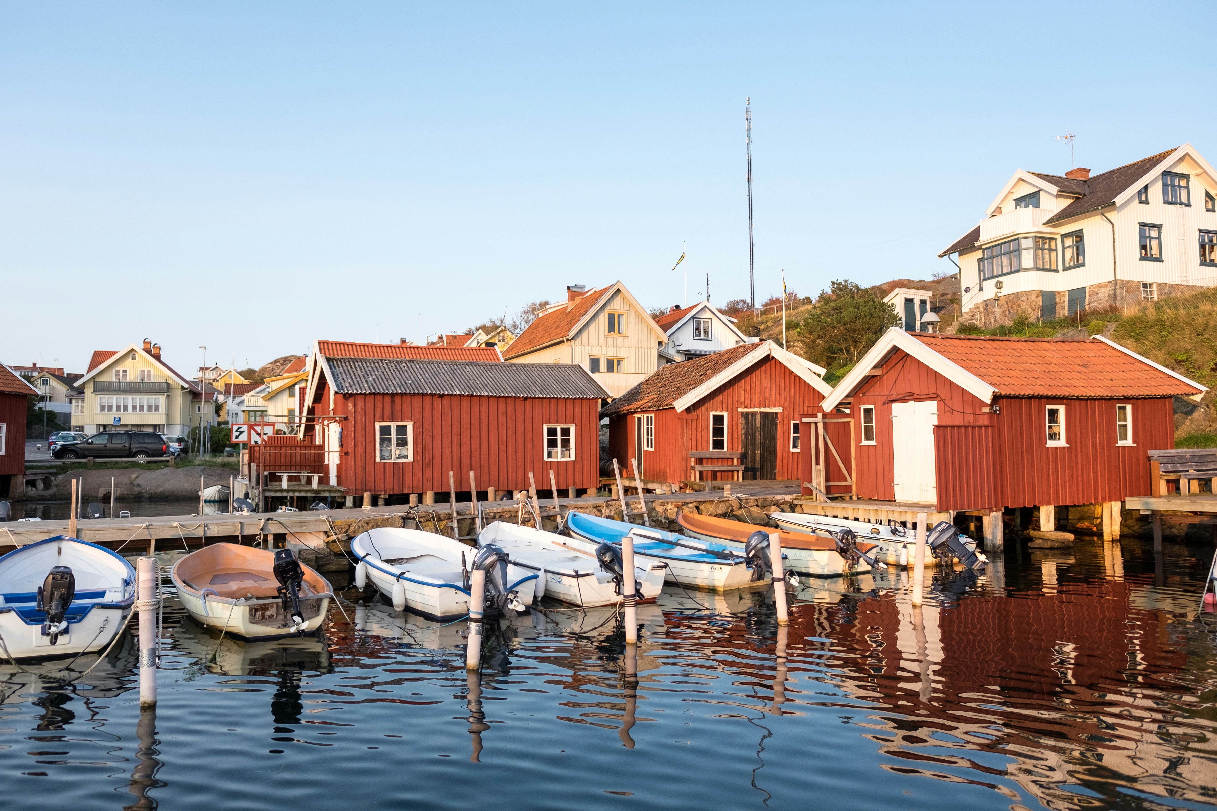boats on dock during daytime