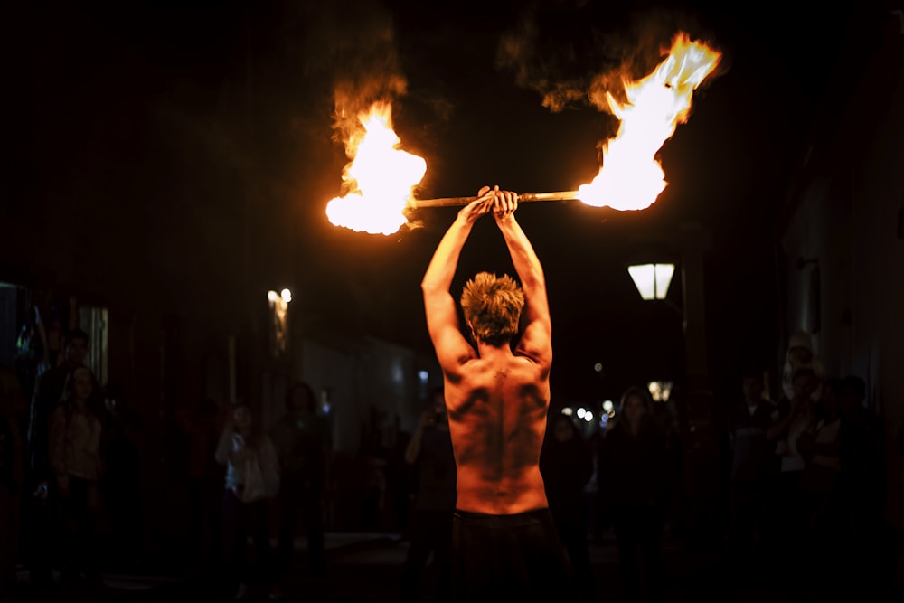 man demonstrating fire dance