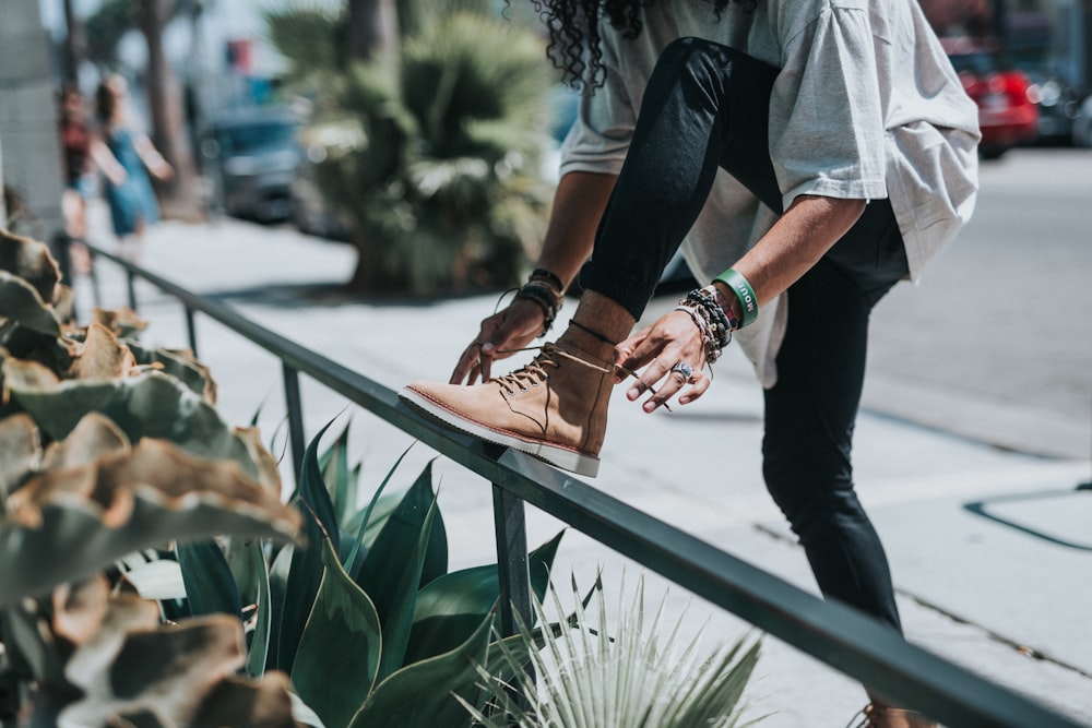 woman stepping on bar