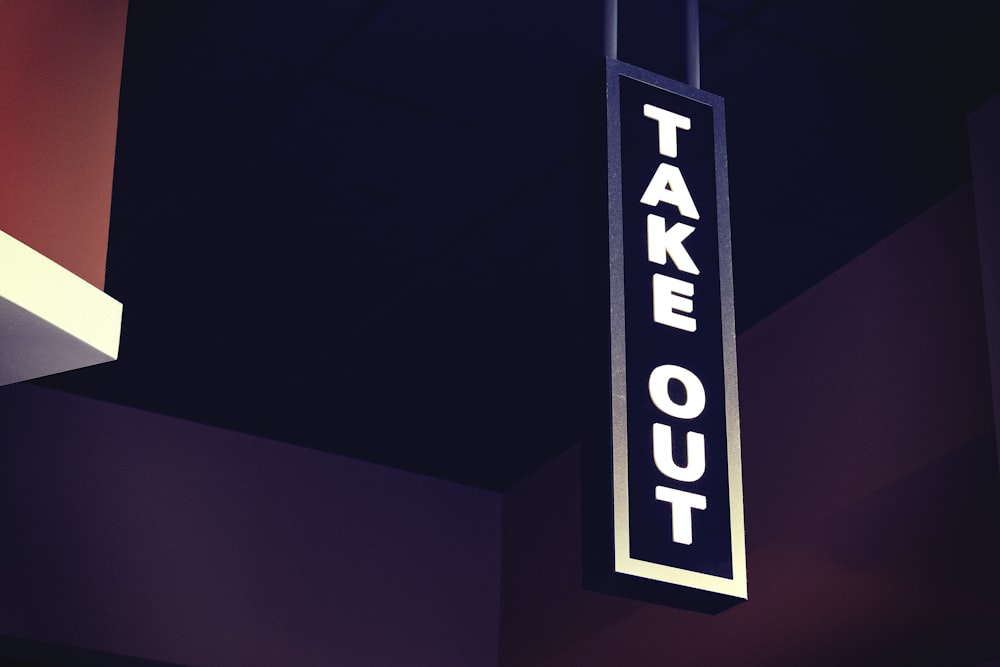 closeup photo of takeout signage