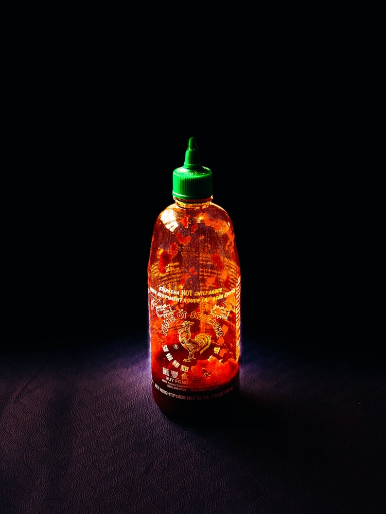 Almost empty Sriracha sauce