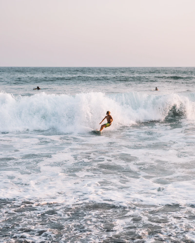A surfer riding a clean wave
