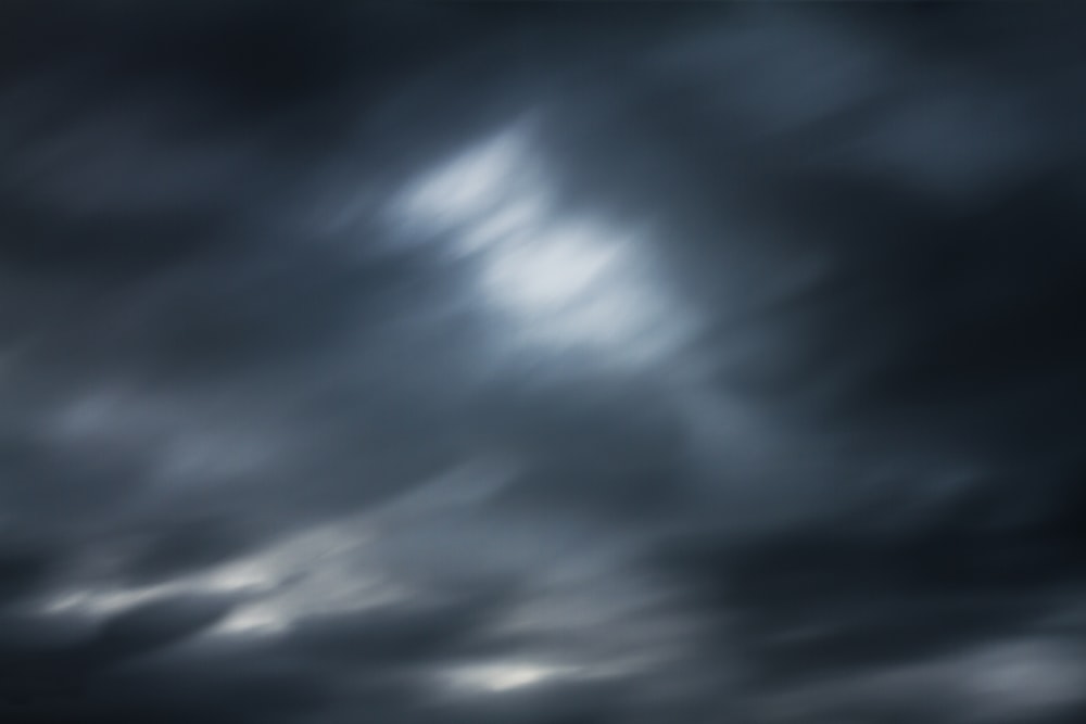 a black and white photo of a cloudy sky