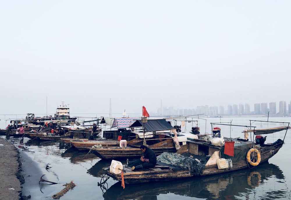 tugboat parked near shores