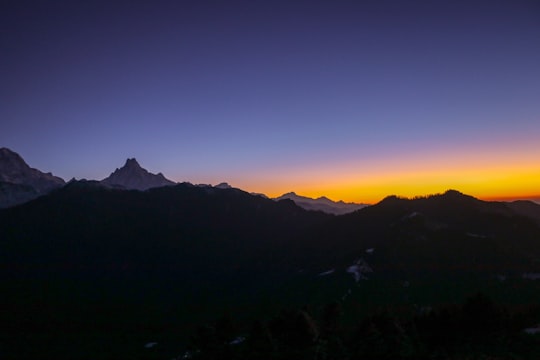 silhouette of mountains during golden hour in Annapurna Nepal