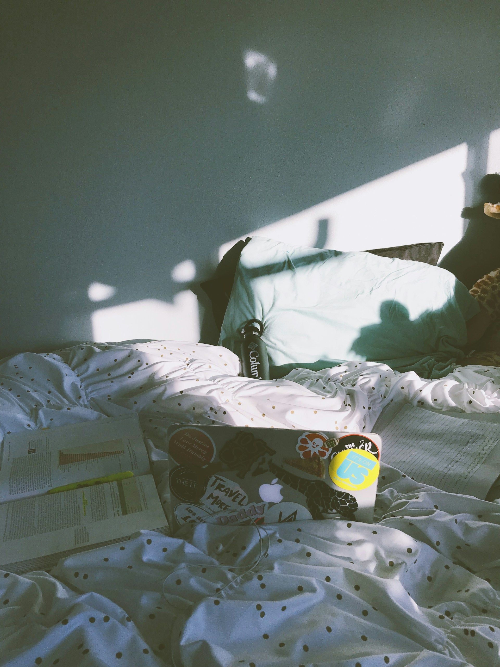 woman wearing yellow long-sleeved dress under white clouds and blue sky during daytime