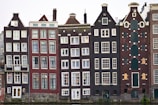 assorted-color houses under white sky