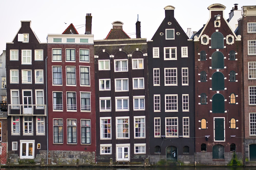 assorted-color houses under white sky photo – Free Amsterdam Image on  Unsplash