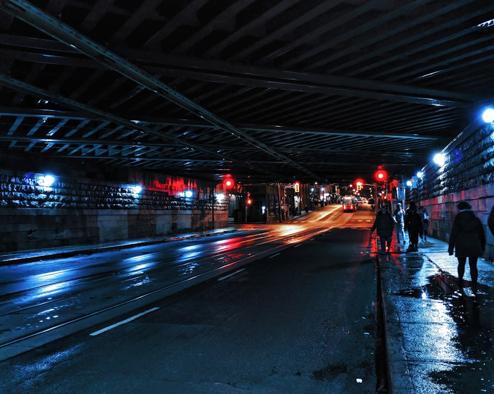 people walking on roadway