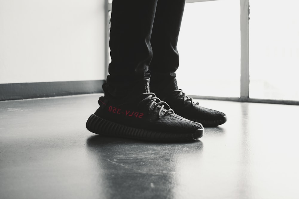 pair of black Adidas Yeezy Boost 350 V2