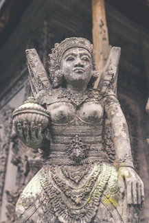 Stone statue carved by hand, embodying cultural heritage and natural beauty.