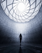 woman wearing black shirt facing the ceiling