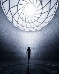 woman wearing black shirt facing the ceiling
