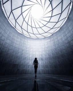 woman wearing black shirt facing the ceiling