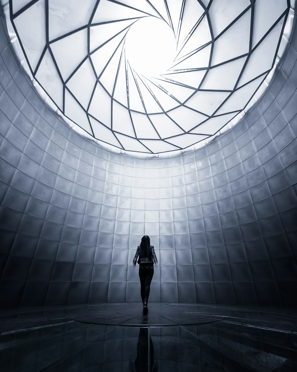 woman wearing black shirt facing the ceiling