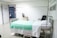 gray gatch bed in hospital
