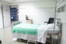 gray gatch bed in hospital