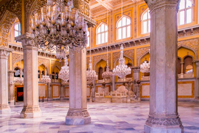 Spacious party hall featuring polished marble flooring and countertops.