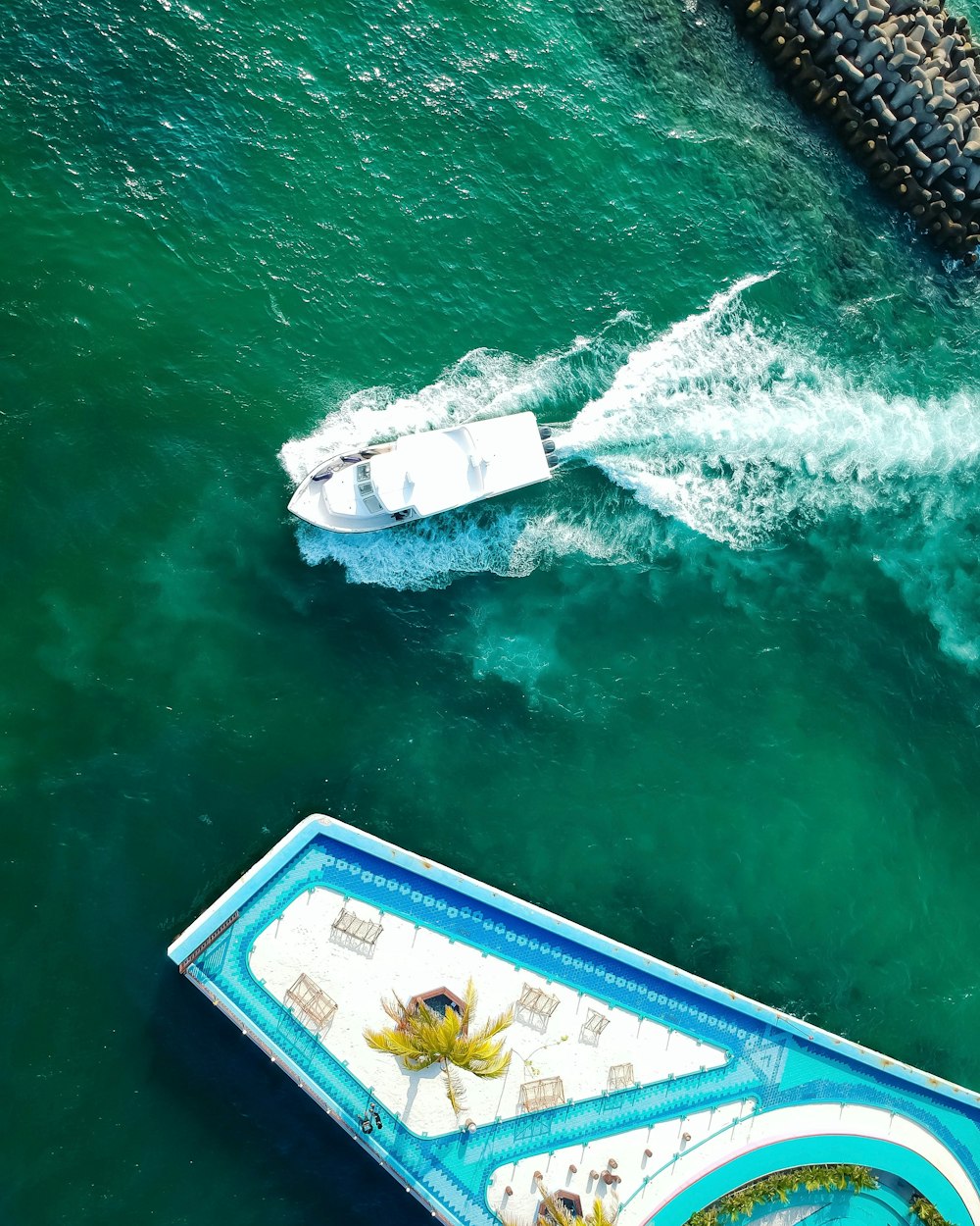 aerial view of boat sailing on sea