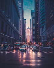 vehicles near buildings at night time