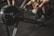Close-up of a professional rowing machine in use during an intense workout session.