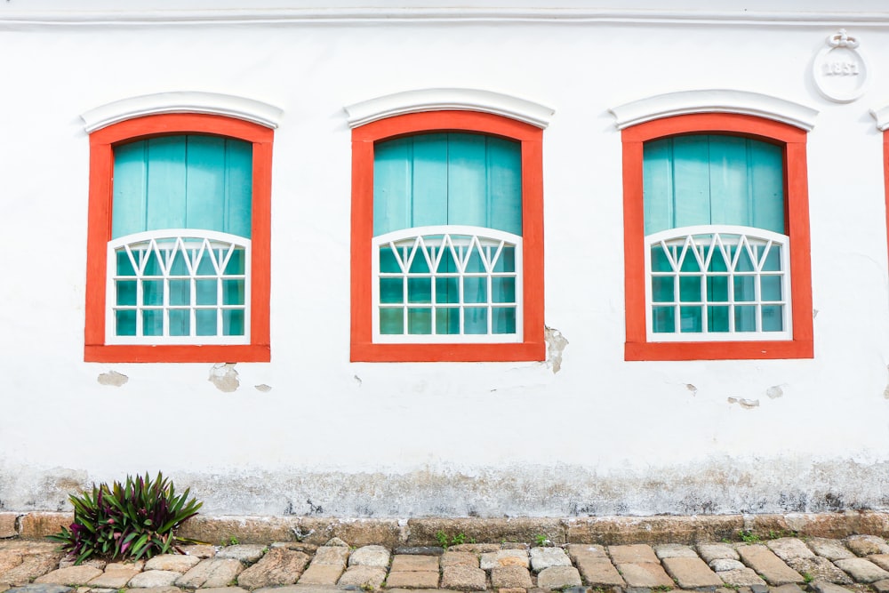 red metal framed glass window