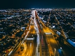 time-lapse photography of city buildings and road