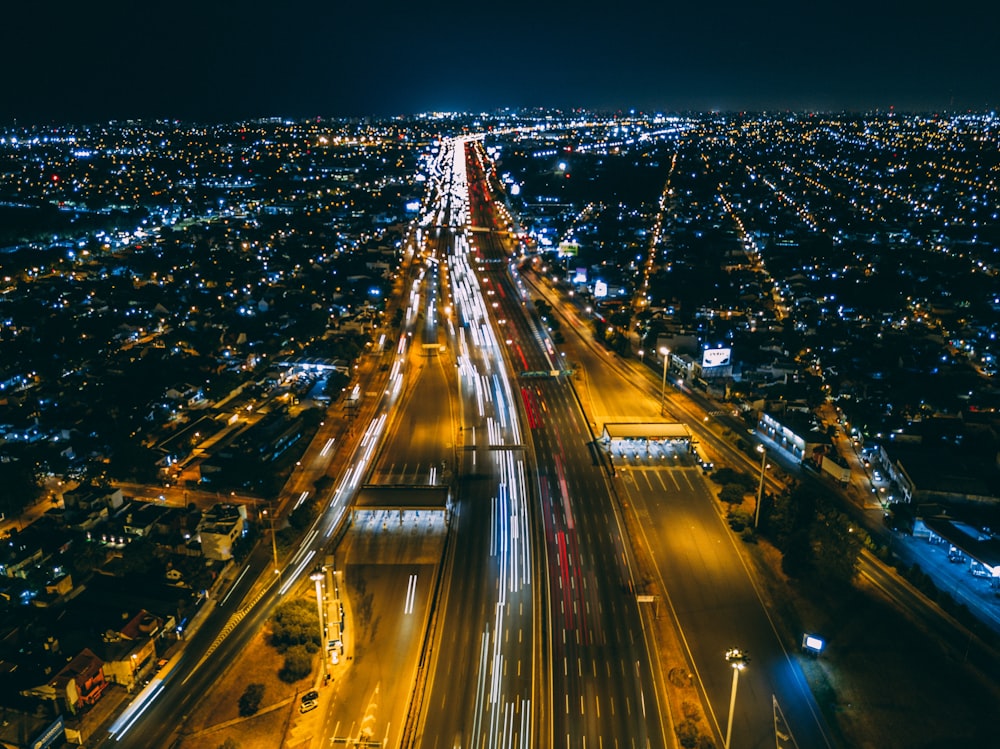 time-lapse photography of city buildings and road