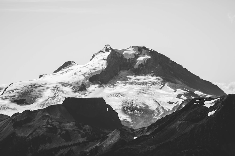 grayscale photography of snow-capped mountain