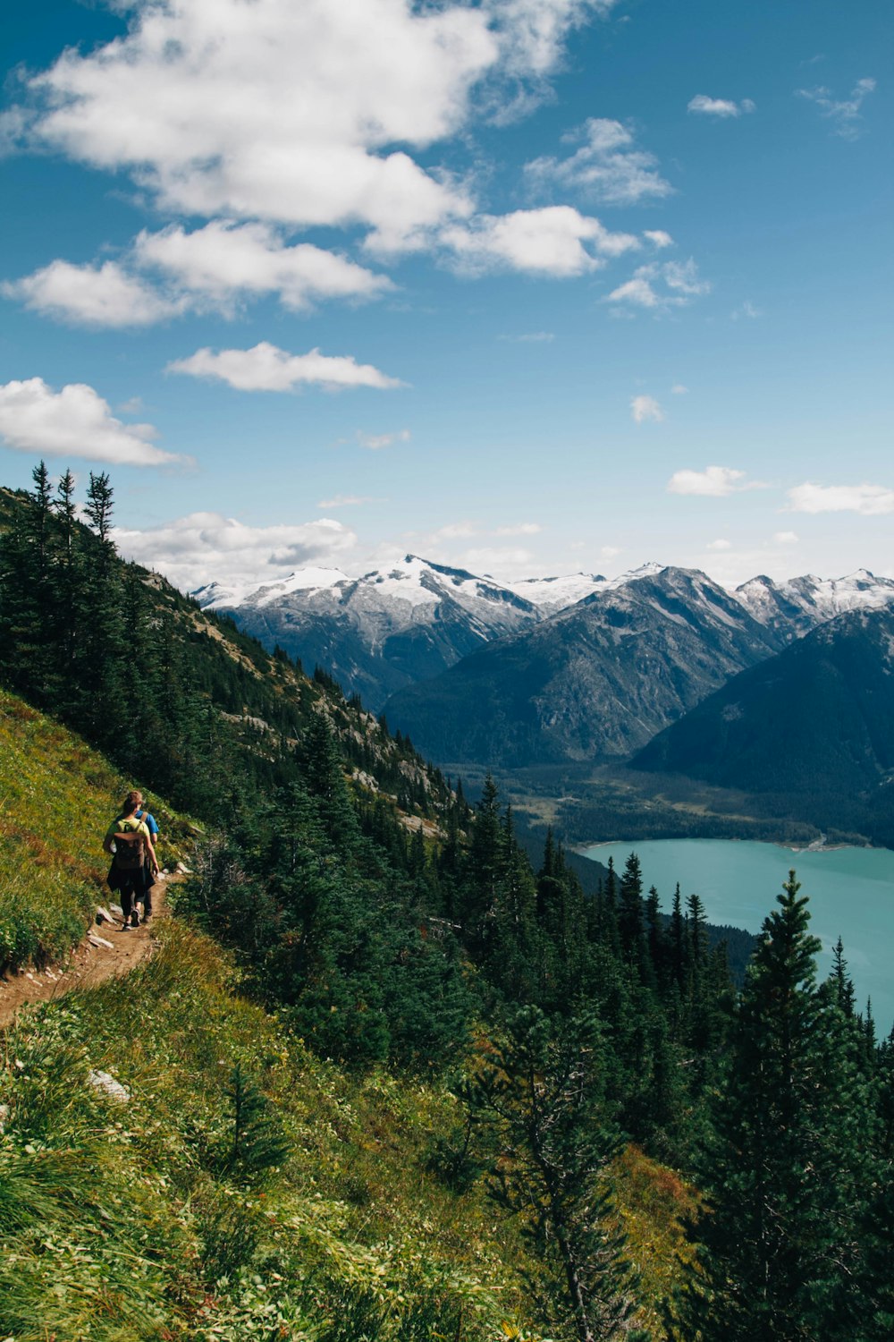 person walking on mountain during daytime