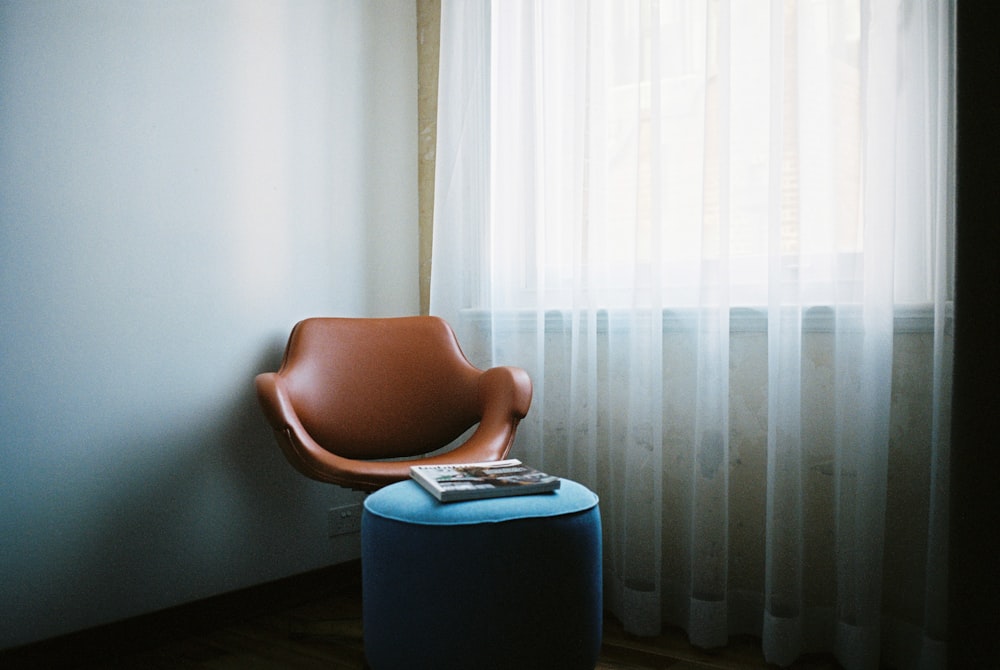 brown leather pedestal chair