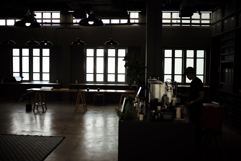 silhouette of man in kitchen