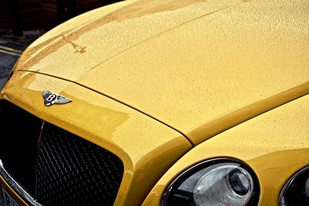 yellow Bentley car