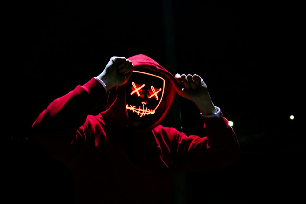 man wearing red hoodie