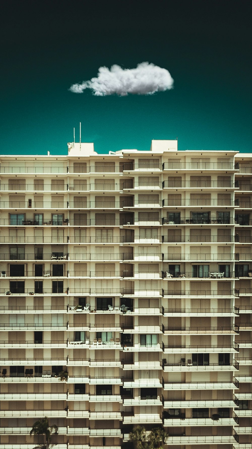 white high-rise building at daytime