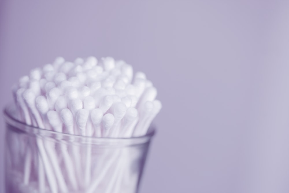 white cotton buds in container