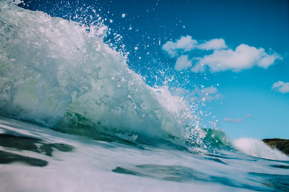 macro photography of splashing water waves