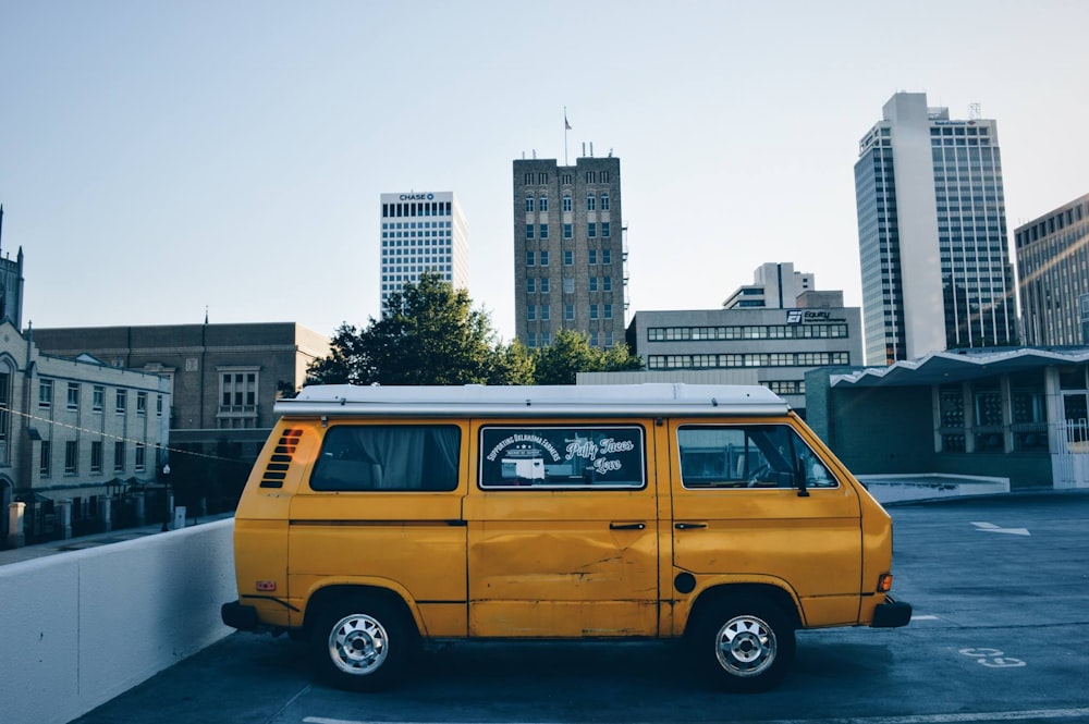 yellow van on parking lot