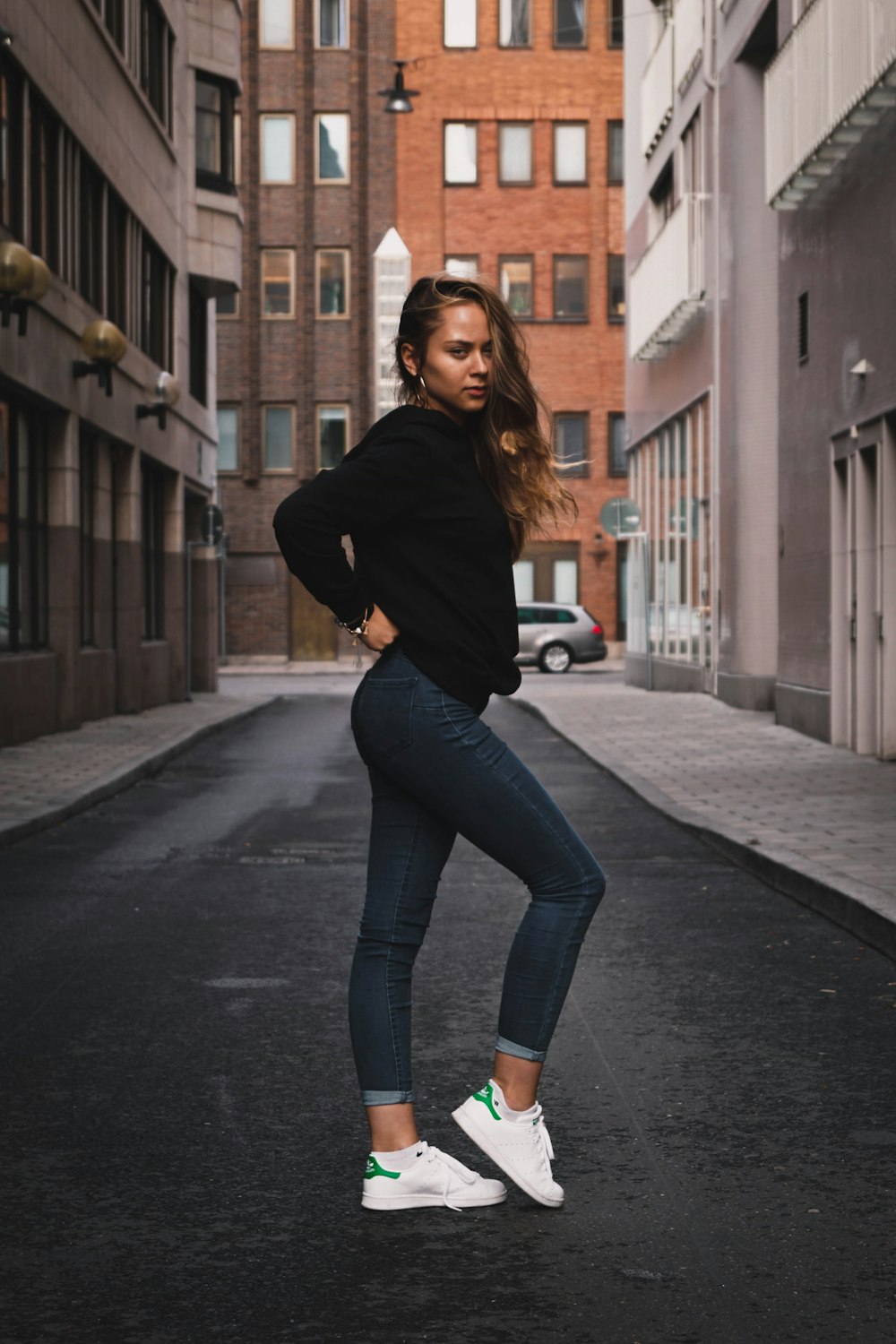 woman standing on road