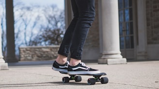 person riding on cruiser board