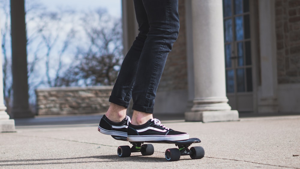 person riding on cruiser board