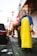 man standing beside a road