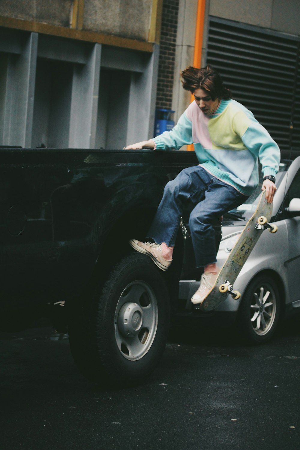 man skateboarding on truck