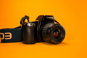 selective focus photography of Canon DSLR Camera
