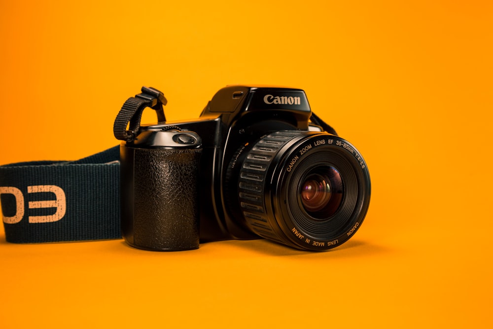 selective focus photography of Canon DSLR Camera