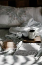 A serene morning scene with a journal and soft golden light, representing a 30-day personal growth journey.