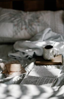 A serene morning scene with a journal and soft golden light, representing a 30-day personal growth journey.