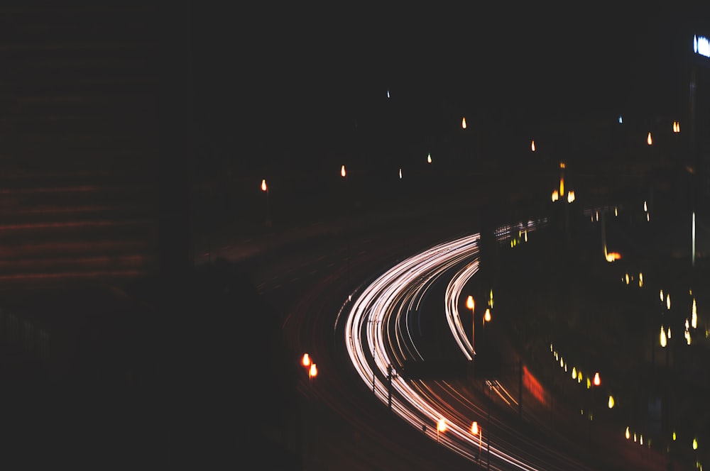 a blurry photo of a city street at night